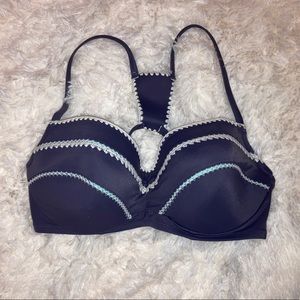 Purple swim top with crochet detailing